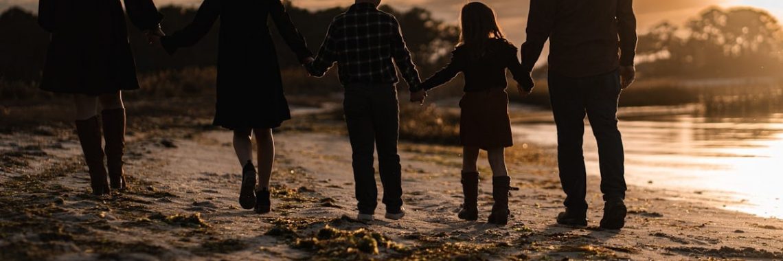 Family walk at sunset